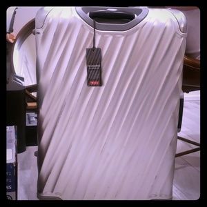 Tumi suite case
